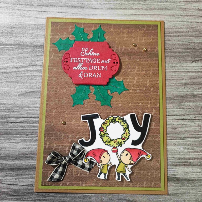 Eine festliche Feiertagskarte mit Stechpalme und Elfen.
Schlüsselwörter: Stechpalme, Elfen