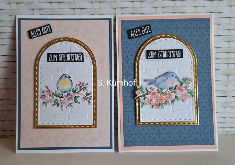 Zwei handgefertigte deutsche Geburtstagskarten, inspiriert von Mach was draus 25. Juli, zeigen gewölbte Rahmen, Blumen- und Vogelillustrationen sowie "Alles Gute" und "Zum Geburtstag" Grüße auf dekorativen Hintergründen.