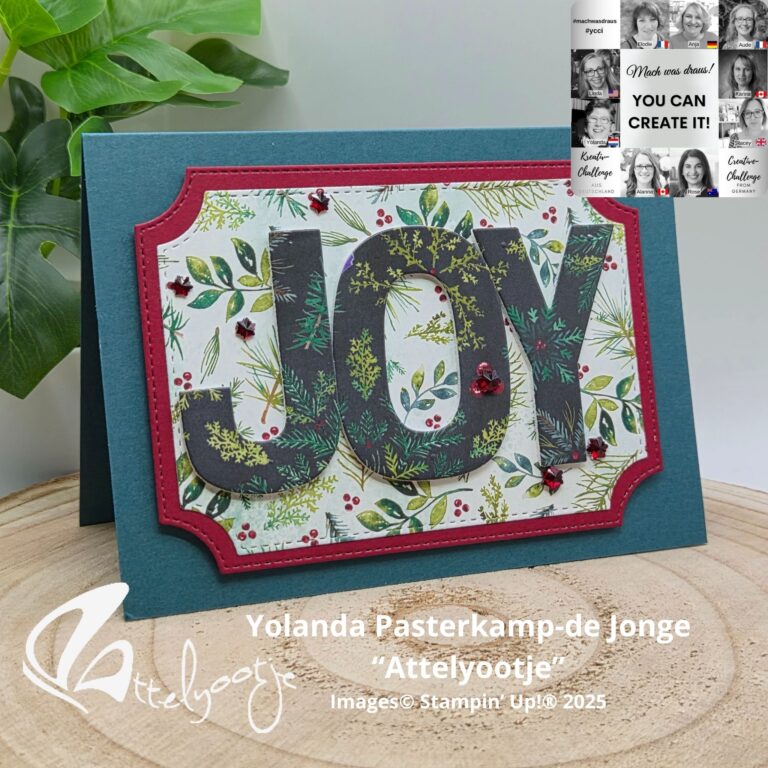 Eine handgefertigte Urlaubskarte mit dem Schriftzug "JOY" auf botanischem Hintergrund ist auf einer blauen Karte abgebildet. Das Design stammt von Yolanda Pasterkamp-de Jonge, ein Gruppenfoto der Macher und ist Teil des Projekts Mach was draus 25. Oktober.