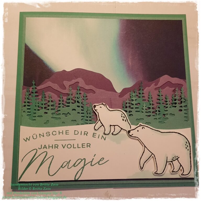 Eine Grußkarte zeigt zwei illustrierte Eisbären vor Kiefern und Bergen, mit Nordlicht am Himmel. Der deutsche Text lautet: "Wünsche dir ein Jahr voller Magie." Inspiriert von Mach was draus 25. Oktober.