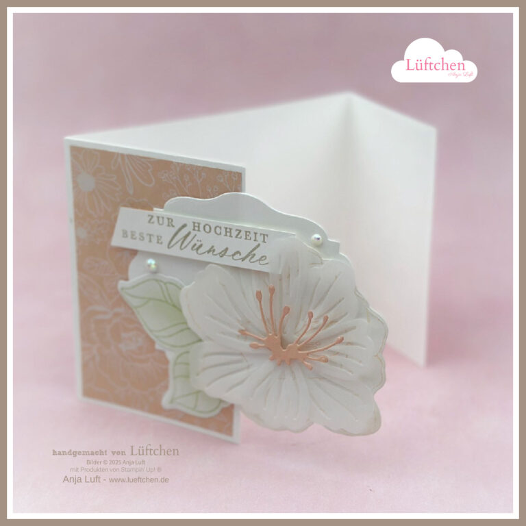 Eine festliche, handgefertigte Hochzeitskarte mit floralem Design und dem Text "Zur Hochzeit Beste Wünsche" auf der Vorderseite auf rosafarbenem Hintergrund - perfekt zum Feiern der Liebe und eines besonderen 25-jährigen Jubiläums.