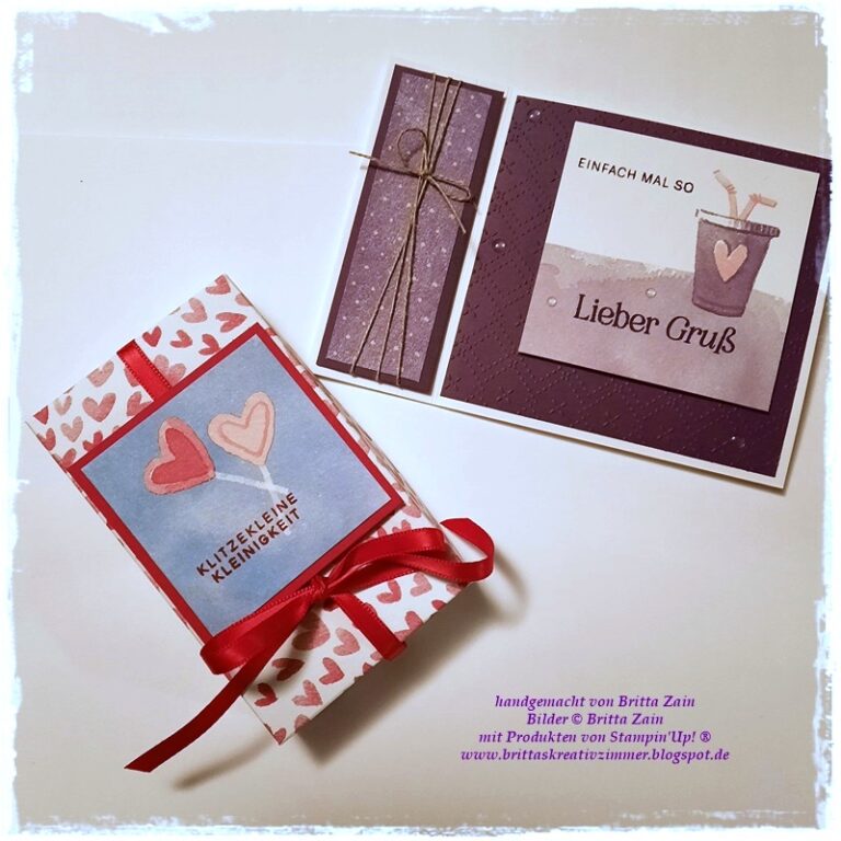 Zwei handgefertigte Grußkarten mit Herzmotiven und deutschem Text, darunter "Mach was draus 26. Januar", sind in Rot- und Violetttönen gehalten und stehen auf einer weißen Fläche.