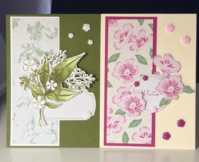 Zwei dekorative, handgefertigte Grußkarten von „Mach was draus“ vom 26. Mai: links eine grüne Karte mit einem Blatt- und Blumenmuster und rechts eine cremefarbene Karte mit rosa Blumen und der Aufschrift „Hallo“.